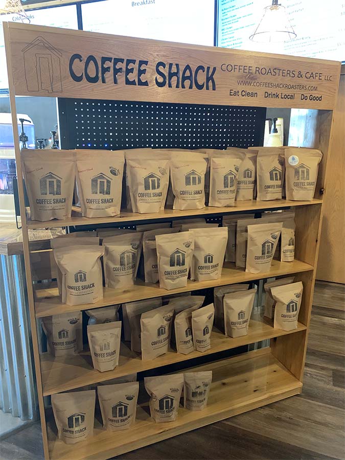 Bags of pre-packaged coffee beans at The Coffee Shack coffee roasters and cafe 